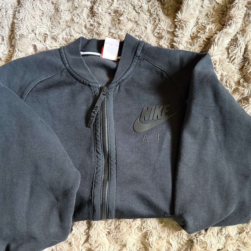 Nike Black Track Jacket with Ribbed Collar and Soft Fabric